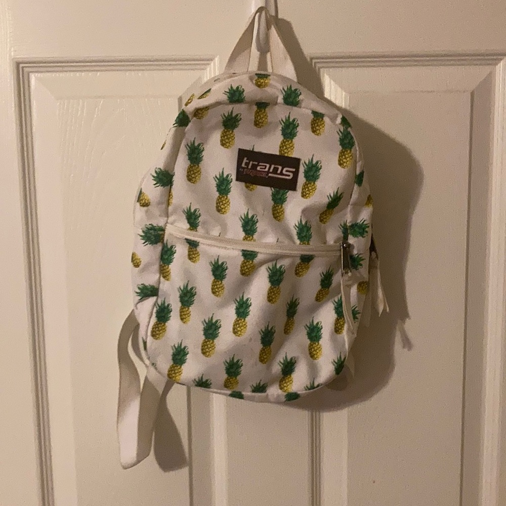 White patterned mini Trans by Jansport bookbag